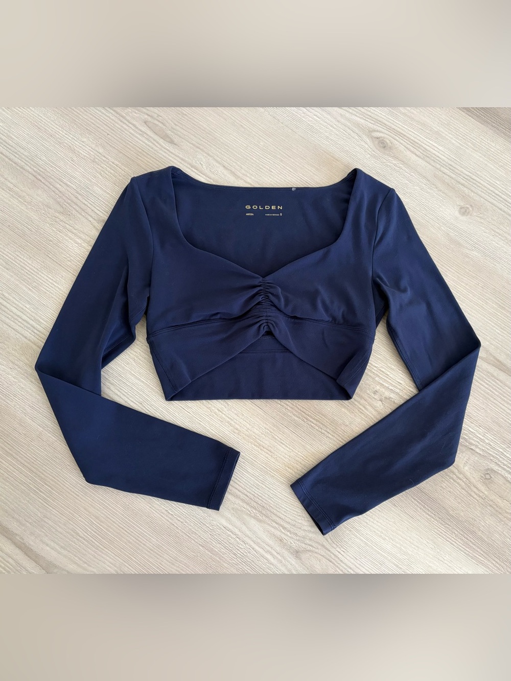 Aritzia Golden Navy Ruched Long-Sleeve Crop Top